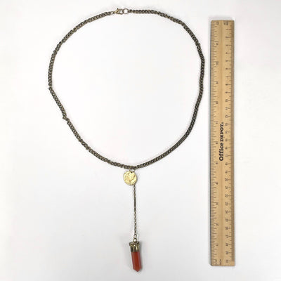 pendant necklace with ruler for size reference
