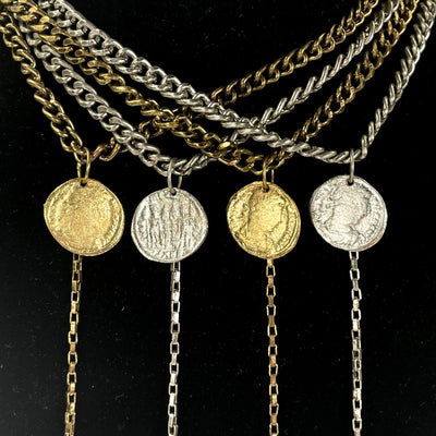 close up of coin pendant for details and possible variations