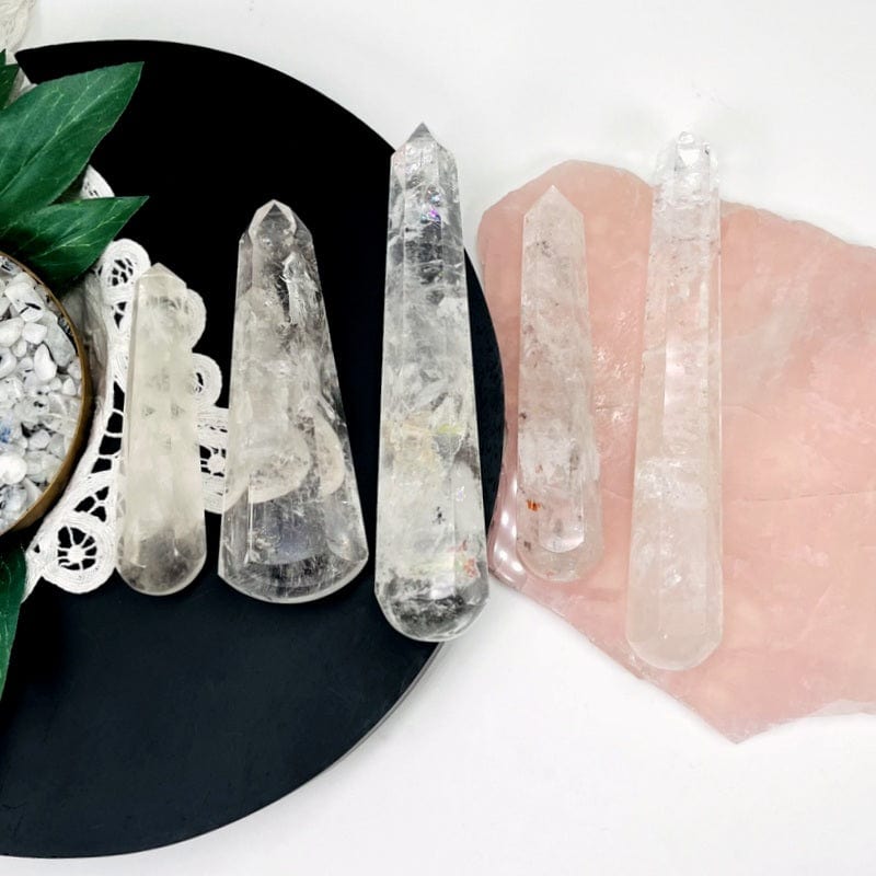 multiple massage wands displayed to show the differences in the sizes and quartz shades 