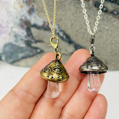 mushroom pendants in hand for size reference 