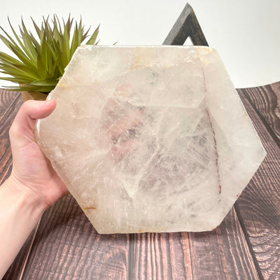 crystal quartz platter in hand for size reference 