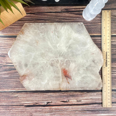overhead view of crystal quartz platter with ruler for size reference