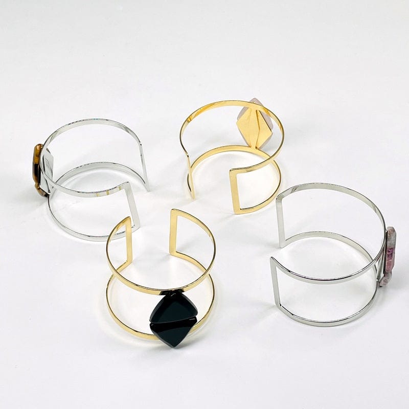 bracelets displayed in different angles showing the side and the back of the cuffs