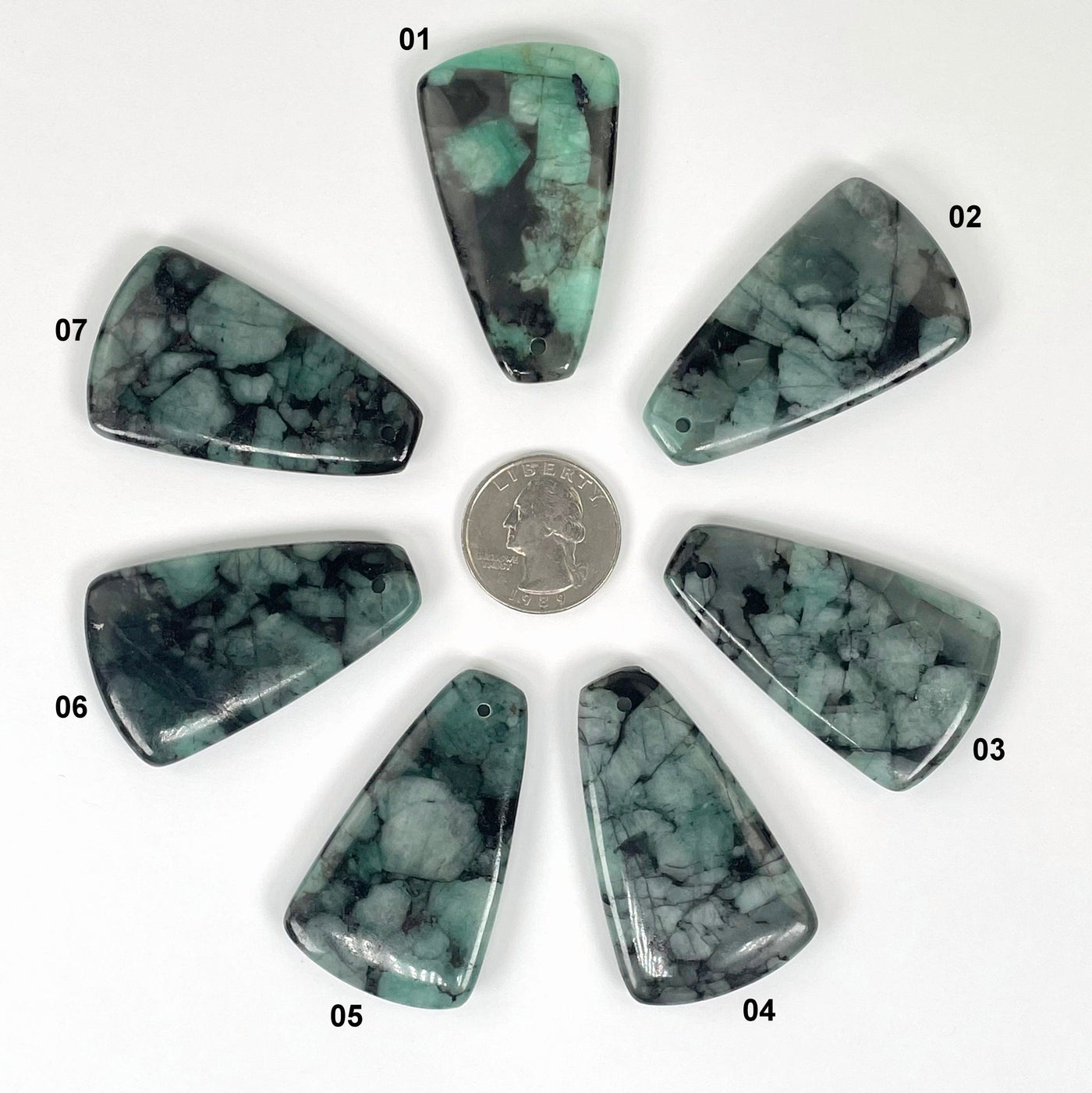all emerald polished point options with quarter for size reference