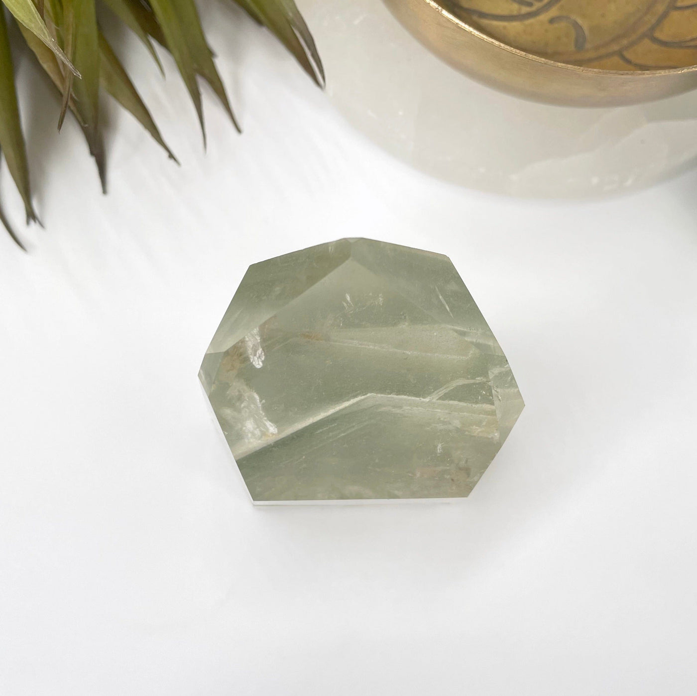 overhead view of rutilated crystal quartz polished point