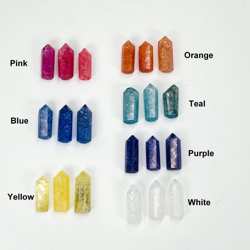 crackled quartz pencil points next to their stone color. available in pink, blue, yellow, orange, teal, purple and white.