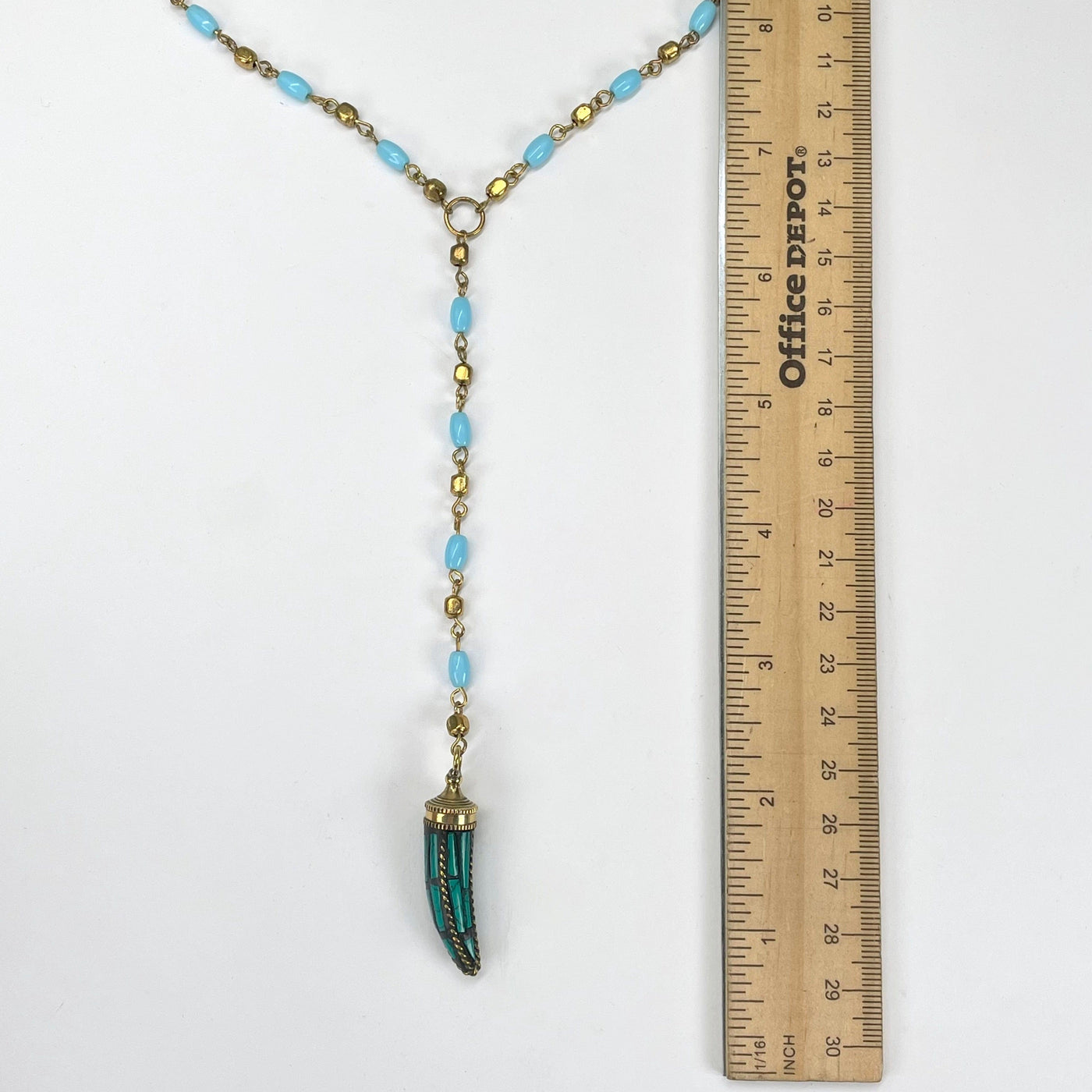 pendant chain and pendant with ruler for size reference