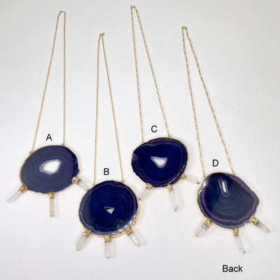back view of the four agate slice necklaces 