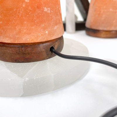 close up of USB chord from the back of a himalayan salt orange mushroom lamp