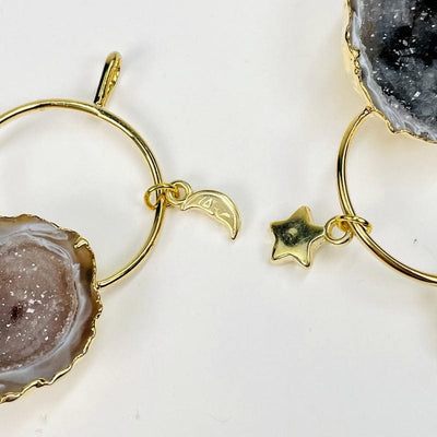 close up of the moon and star charms 