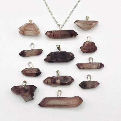 pendants displayed on chain to show the different possible sizes 