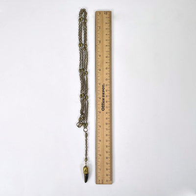 full lengths of tibetan style necklace with ruler for size reference