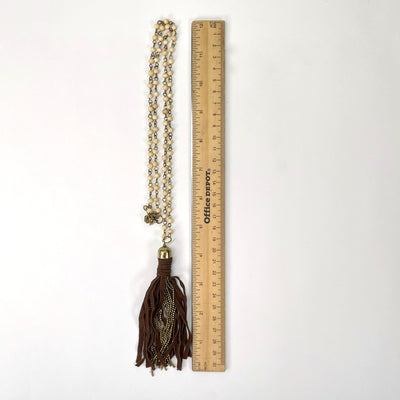 whole necklace with ruler for size reference