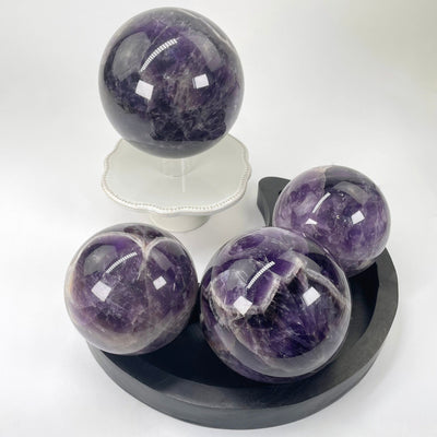 both chevron amethyst polished sphere weight options on display