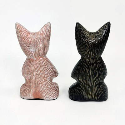 back view of the cat statues 