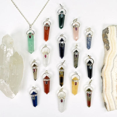 multiple pendants displayed to show the differences in the crystal options 
