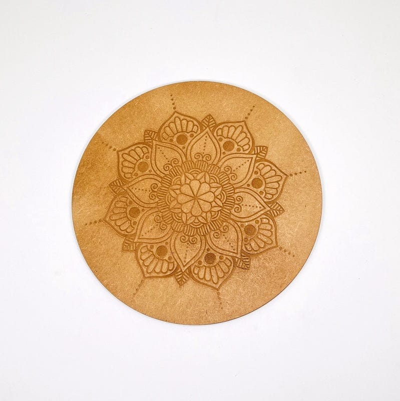 wooden grid with engraved mandala 