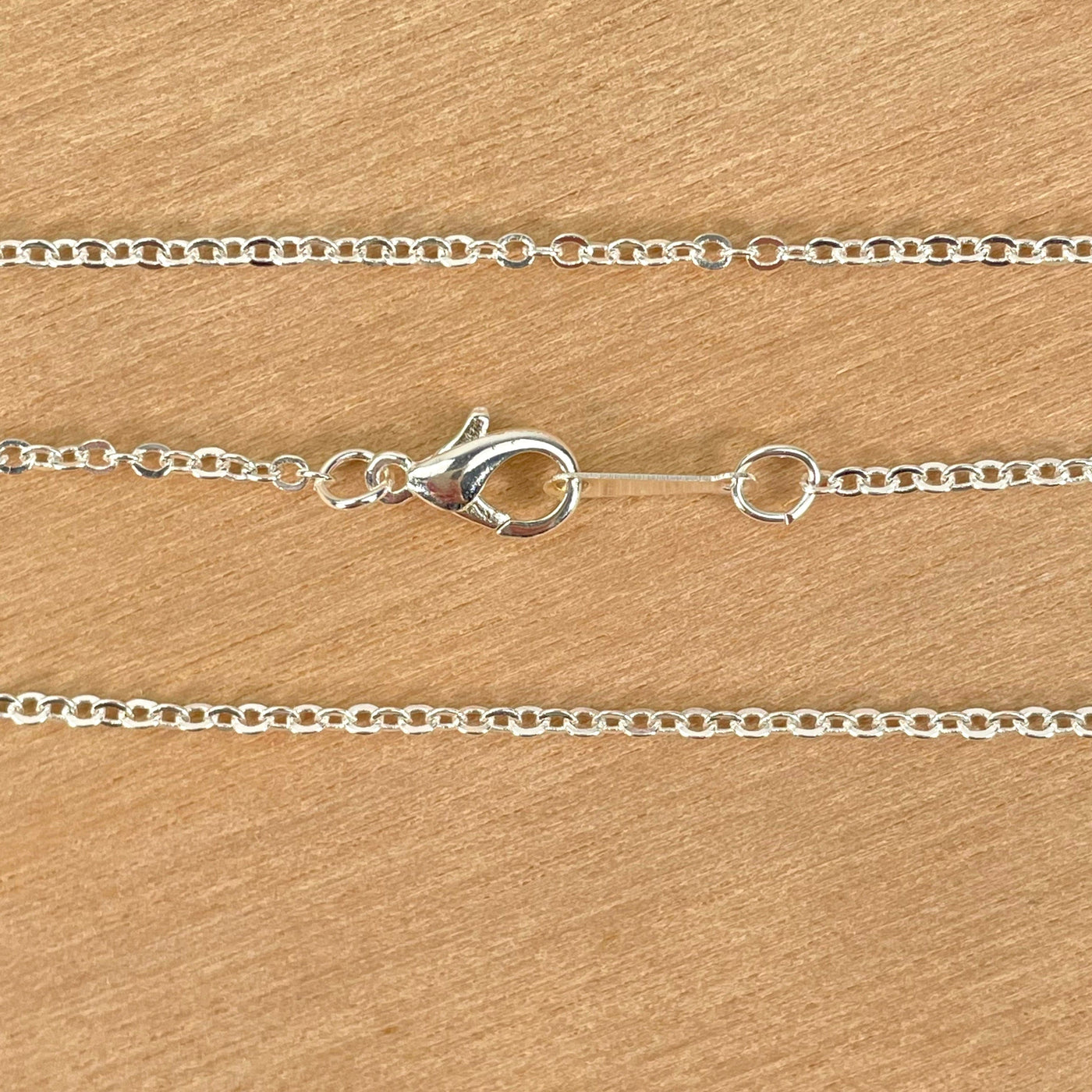 close up of necklace clasp and chain for details