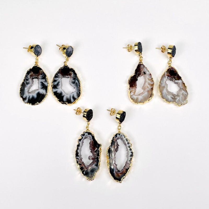 multiple earrings displayed to show the differences in the color shades and sizes 