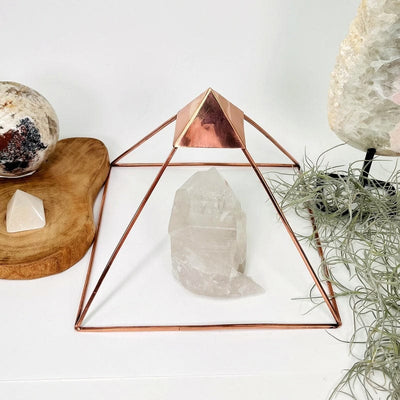 pyramid made out of copper set up as home decor 