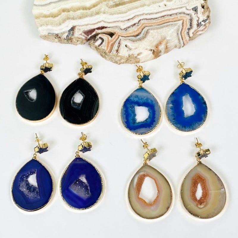 multiple earrings displayed to show the differences in the agate colors and patterns 