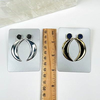 Moon Crescent Earrings with Druzy Accent shown with a ruler for size reference