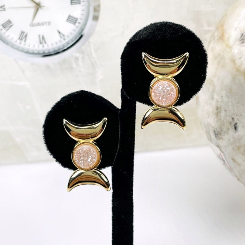 earrings displayed to show how they hang 