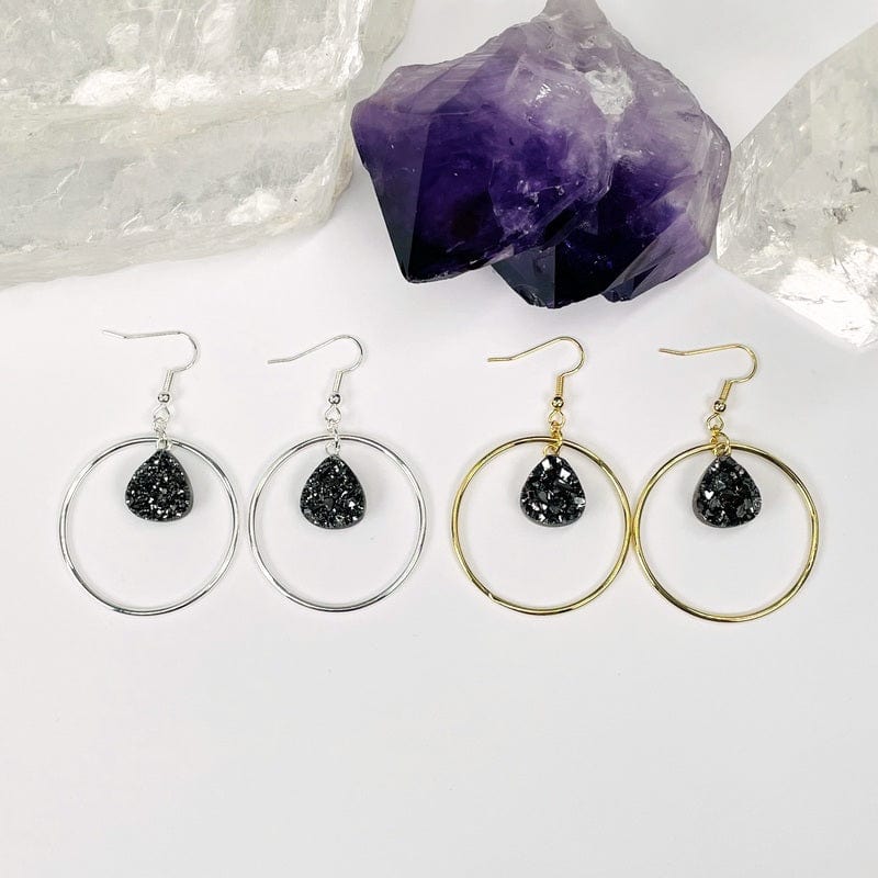 black diamond titanium drop earrings available in gold and silver 