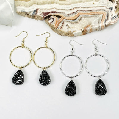 hoop style earrings with a black diamond titanium druzy drop 