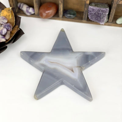 Front facing Agate Druzy Star - Large Polished Star (DOOAK-S9-60) with a white background in an alter.