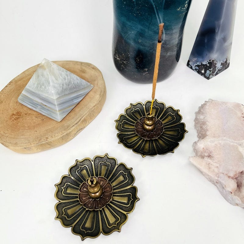 brass lotus incense holders set up as home decor 