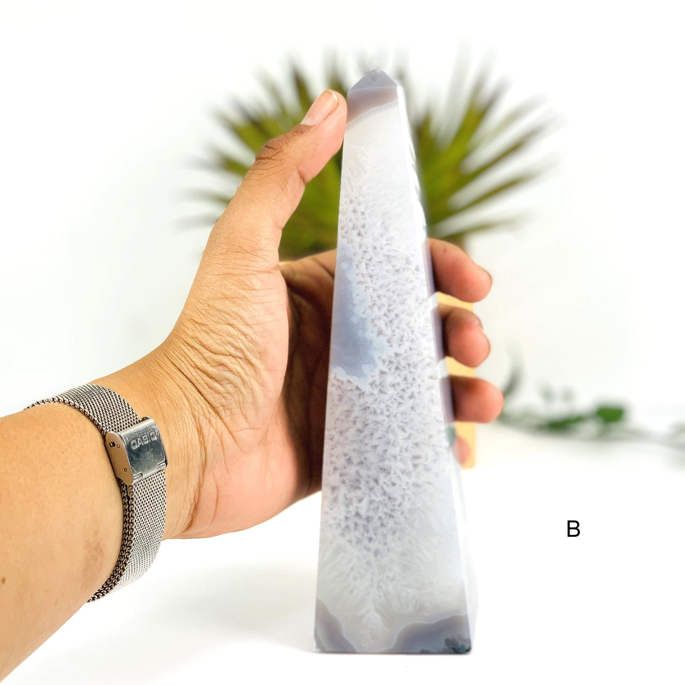 Hand comparing size to  Option B - Natural Agate Obelisk Tower