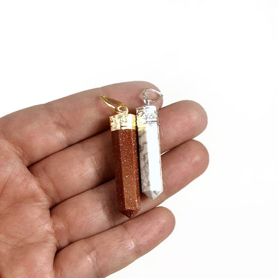 crystal gemstone points in hand 