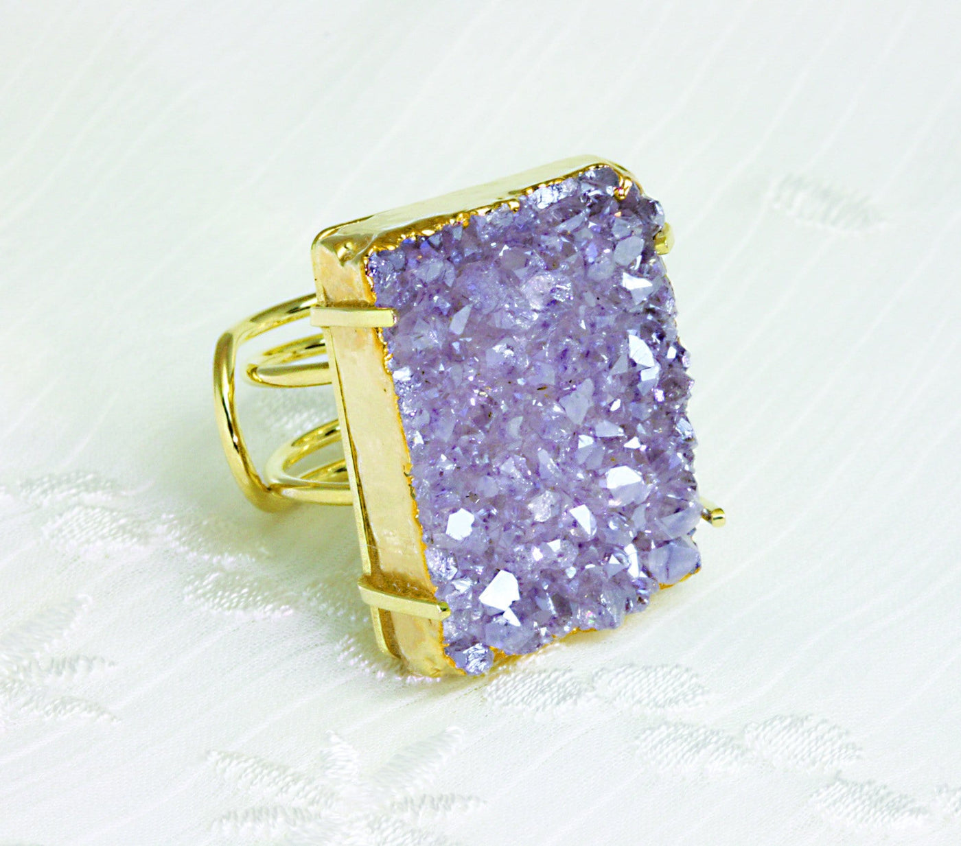 mystic druzy adjustable ring available in a shimmer coating 