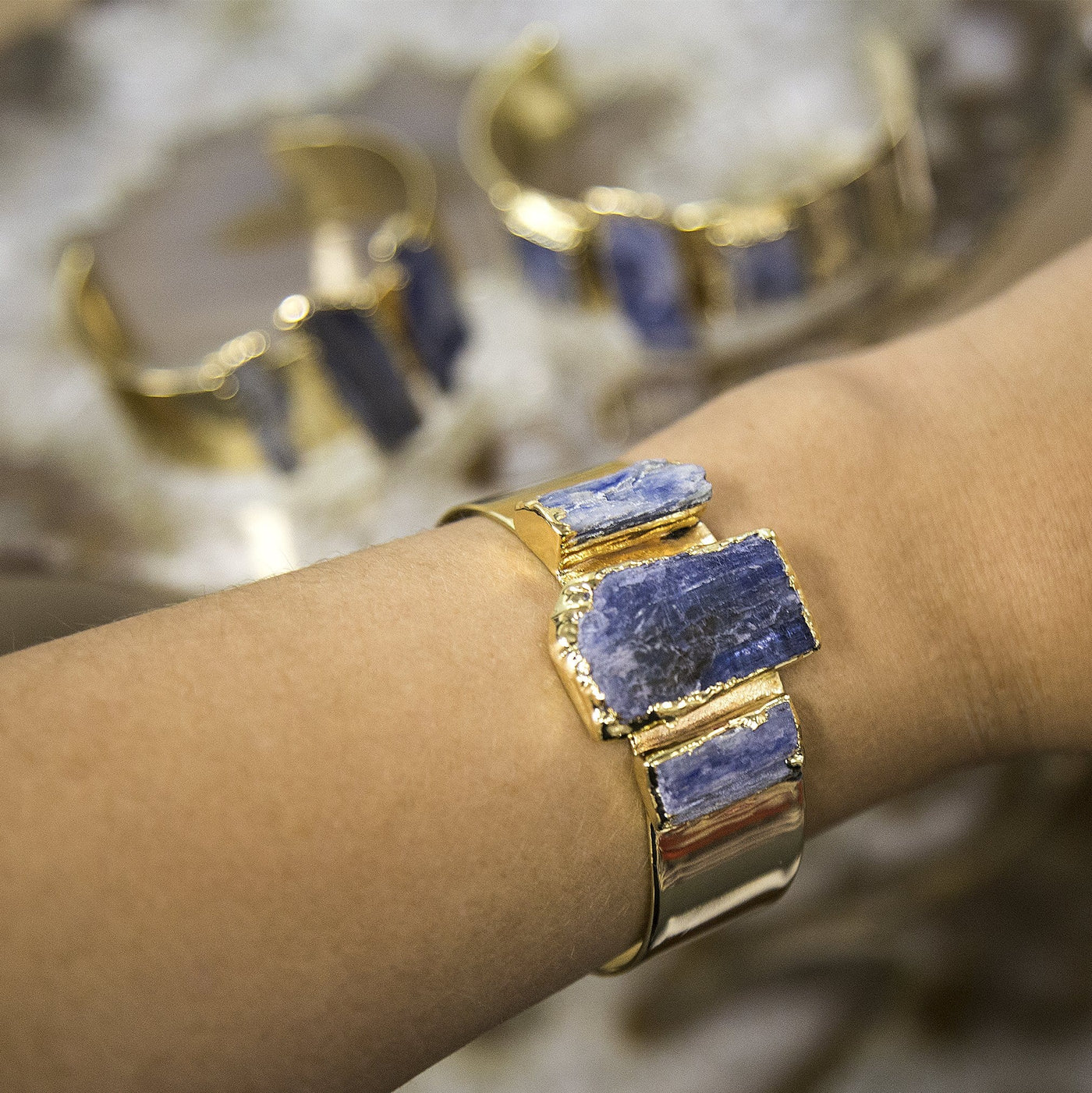 Blue Kyanite Three Stone Bracelet 24k Gold Electroplated on wrist for size and design reference