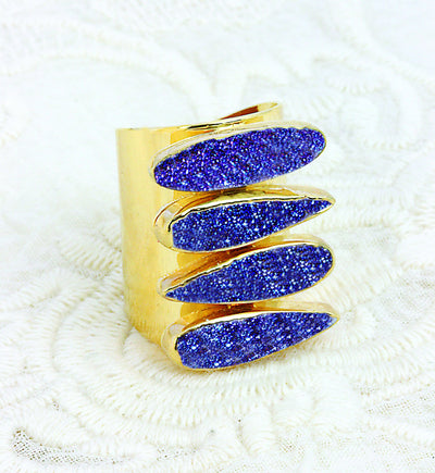 View of the Mystic Blue Titanium Druzy Adjustable Teardrop Druzy Ring with Electroplated 24k Gold Adjustable Cigar Band