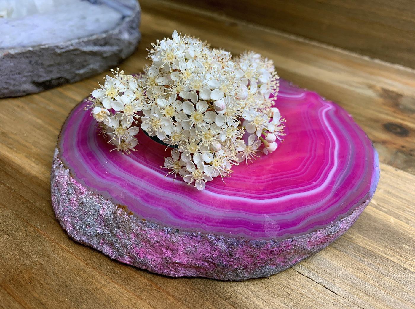 pink agate candle holder with decorations in background