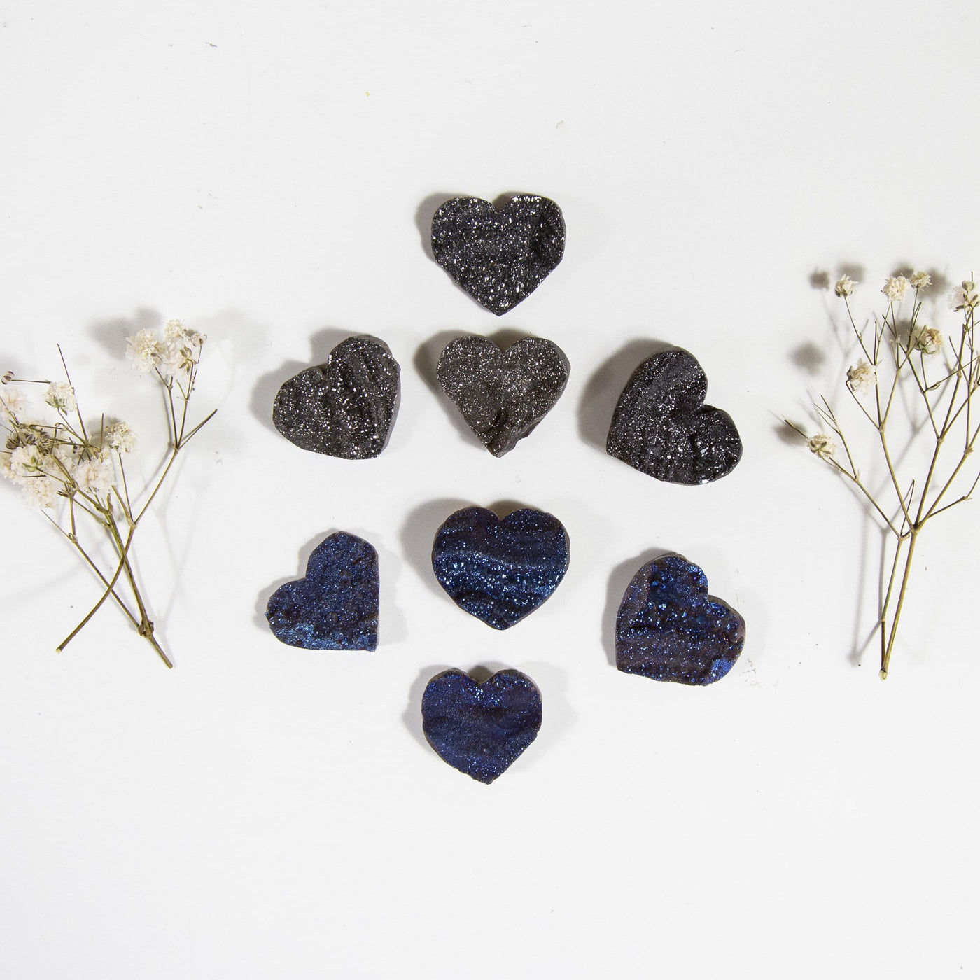 Chalcedony Titanium Treated Hearts in Mystic Blue and Platinum displayed in quantities of 4 each on white background
