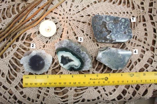 Stalactite Paper Weights next to a ruler for size reference