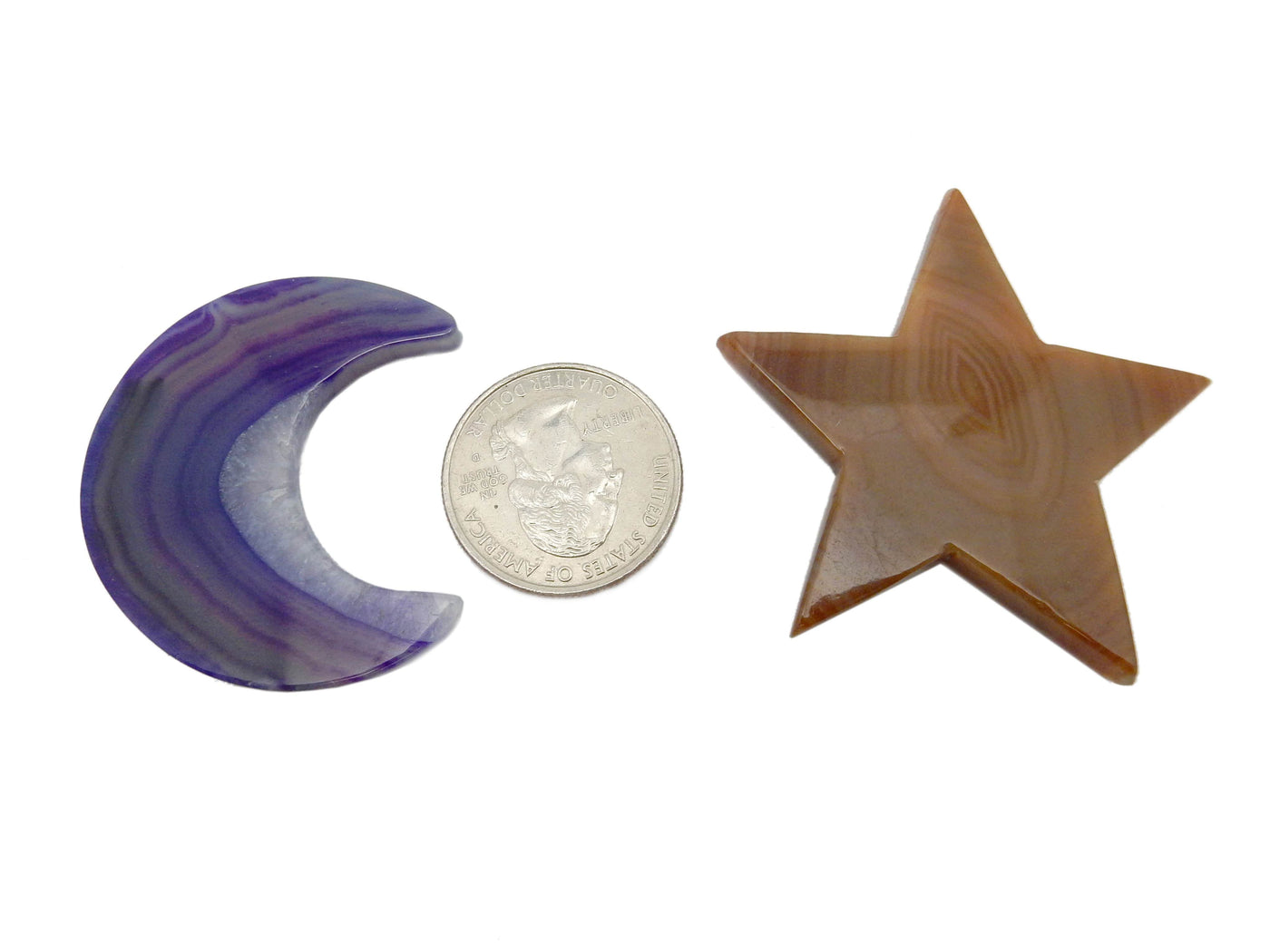 This Picture is showing on of our purple agate moons next to a natural agate star, with a quarter in the center for size reference. 