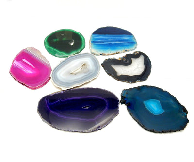 Picture of agate slices size 5 being displayed on a white back ground. 