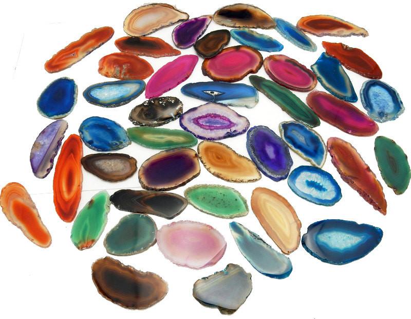 Picture of agate slices Being displayed on a white back ground. 