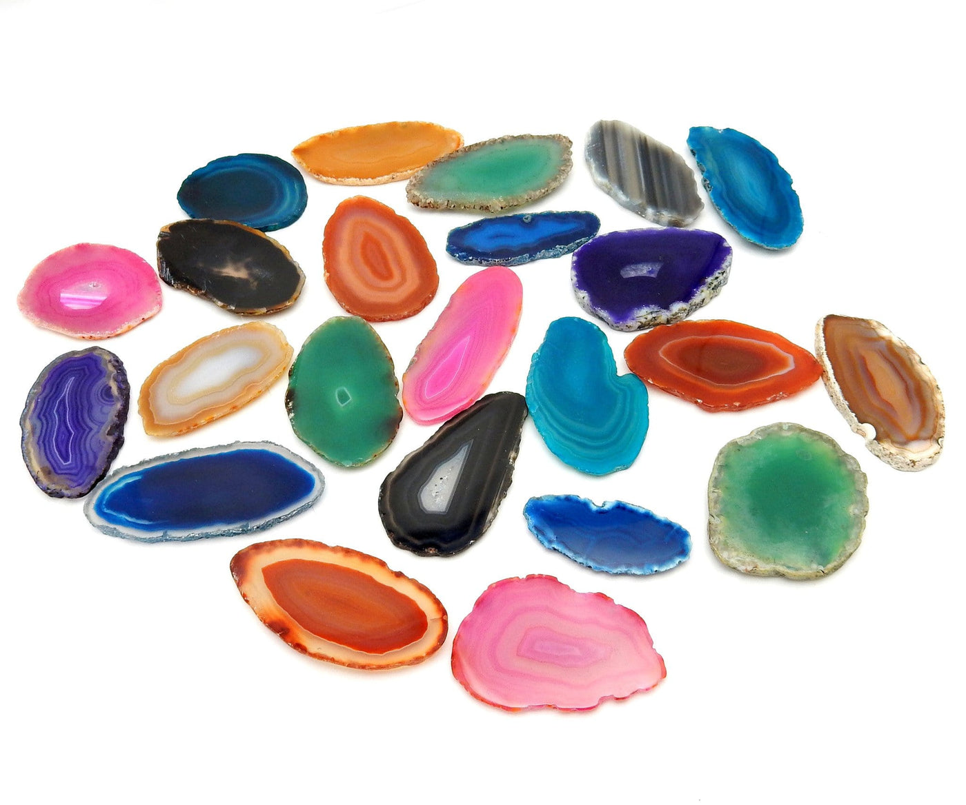 Picture of Multiple color agates size 000, they are also being displayed on a white back ground. 