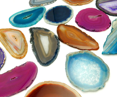 Picture of Multiple color agates size 1, they are also being displayed on a white back ground.