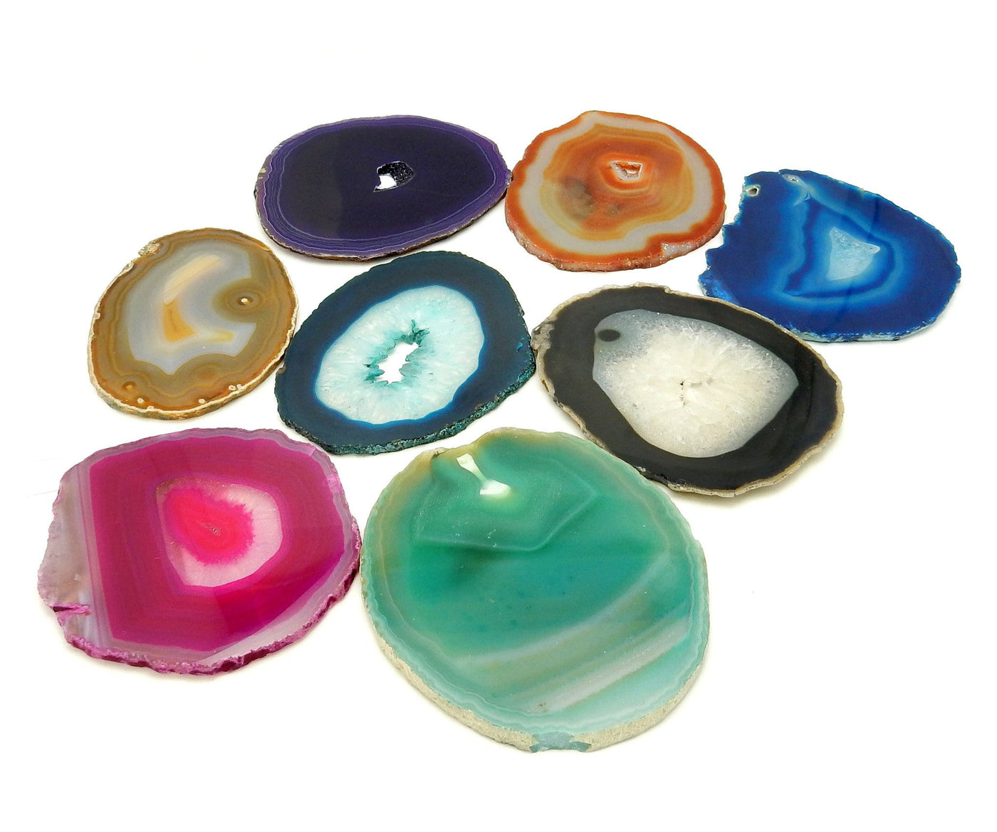 Picture of Multiple color agates size 4, they are also being displayed on a white back ground.