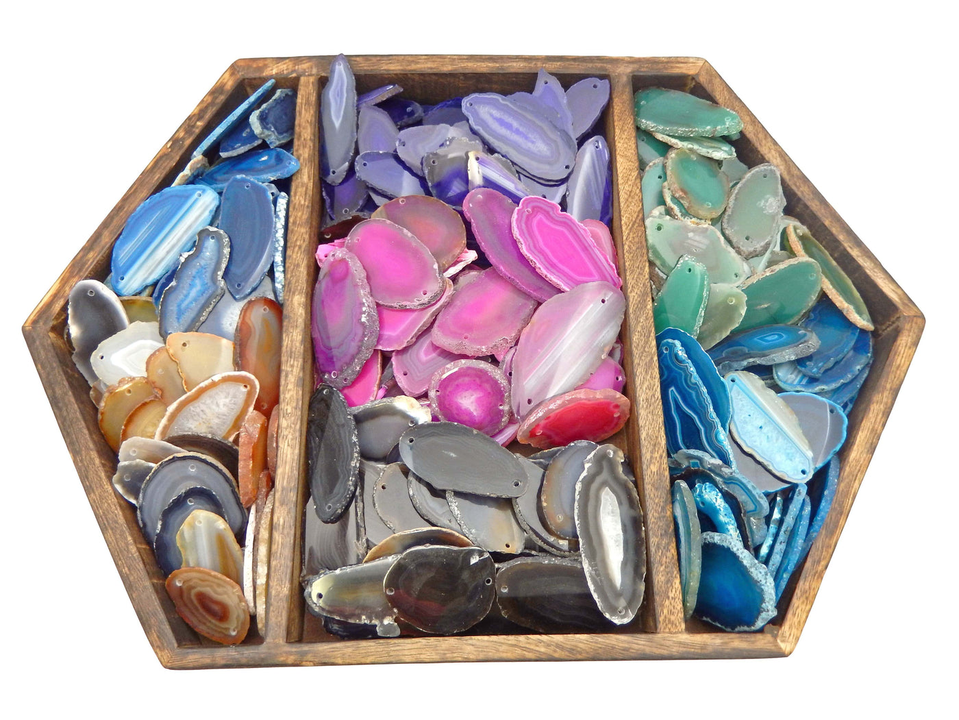 all variety of colors for our agates are being displayed on a dark brown tray. 