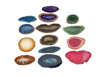 agate slices are being displayed on a white background.