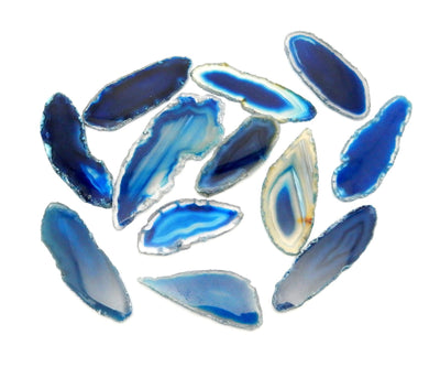 blue agate slices spread out on a white surface