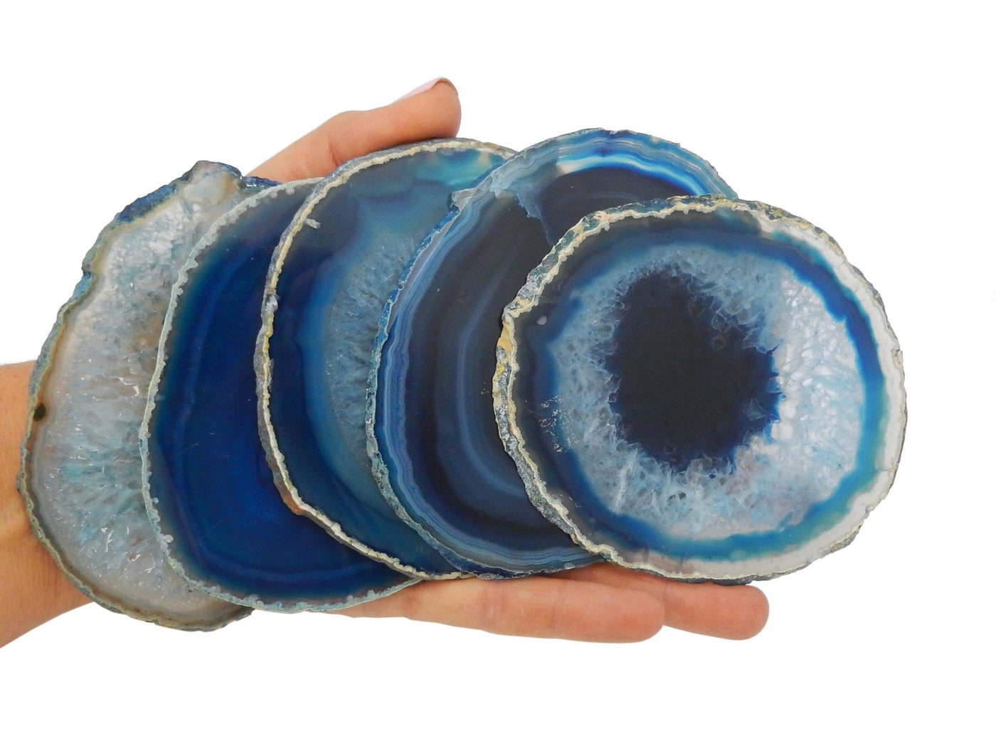 Blue Agate Slices in size #4 displayed in hand for size reference