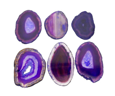 6 Purple Agate Slices Drilled on White Background.